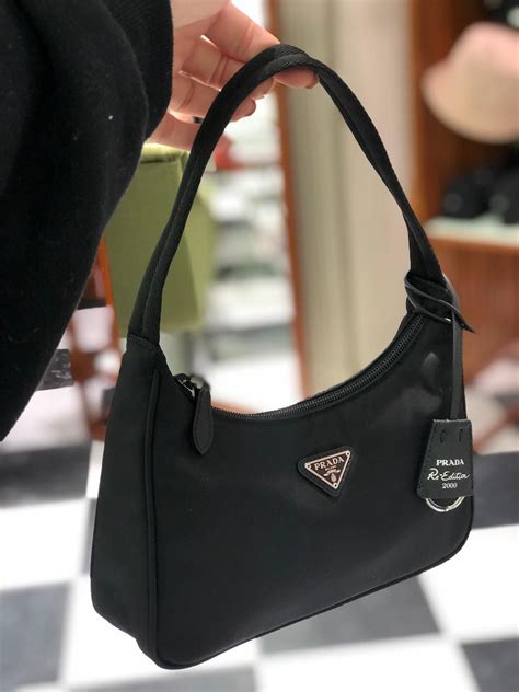 prada patent mini pouch|prada nylon mini bag price.